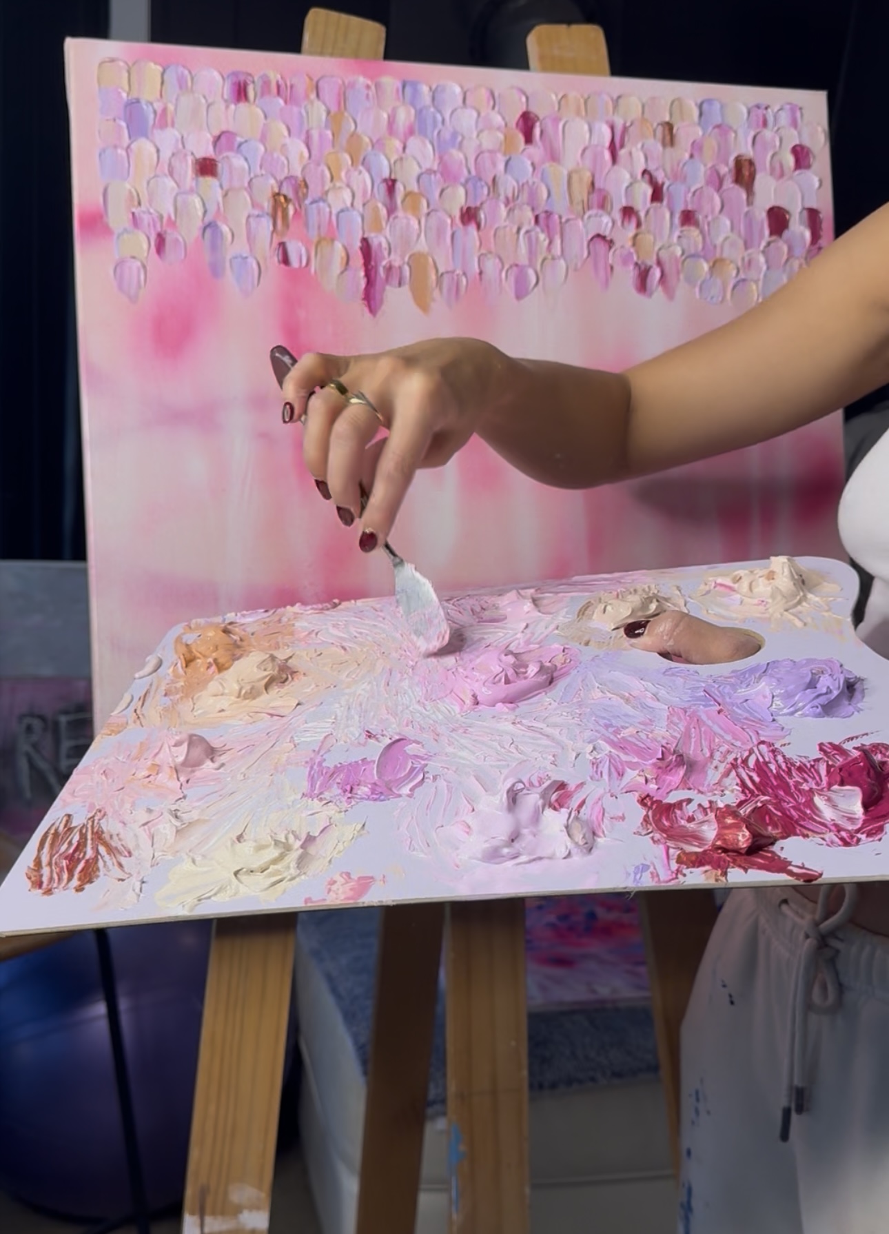 Instagram preview of Gabrielle May painting a pink artwork